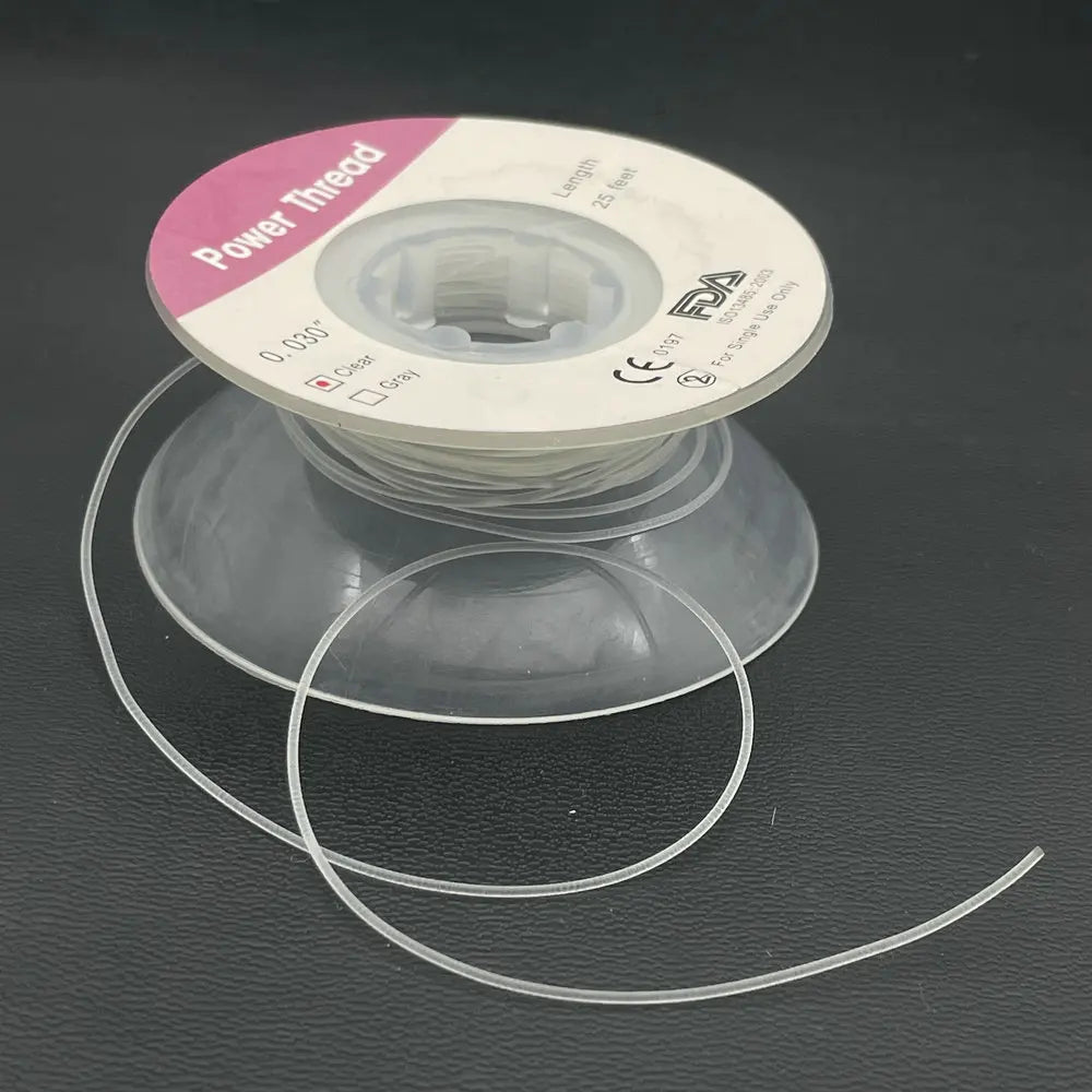 25feet/roll Dental Orthodontic Elastic Power Solid Thread Dental Power Thread 0.030 Dentist Tool