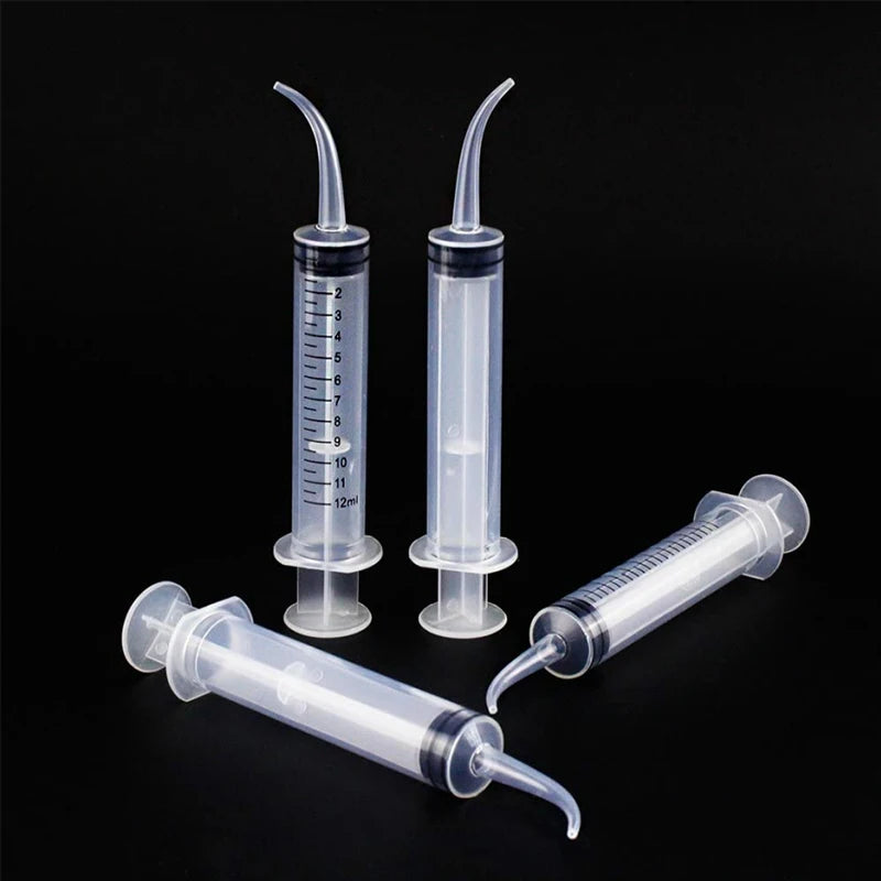 Product Package:  5PCS/10Pcs/20Pcs Dental Disposable Irrigation Syringe With Curved Tip 12ml For Dentist Use Dental Consumable Tool Oral Teeth Whitening  Product Specifiction:  1.Item name:Dental Irrigation Syringe 2.Color:Transparent 3.Material:PP Plas